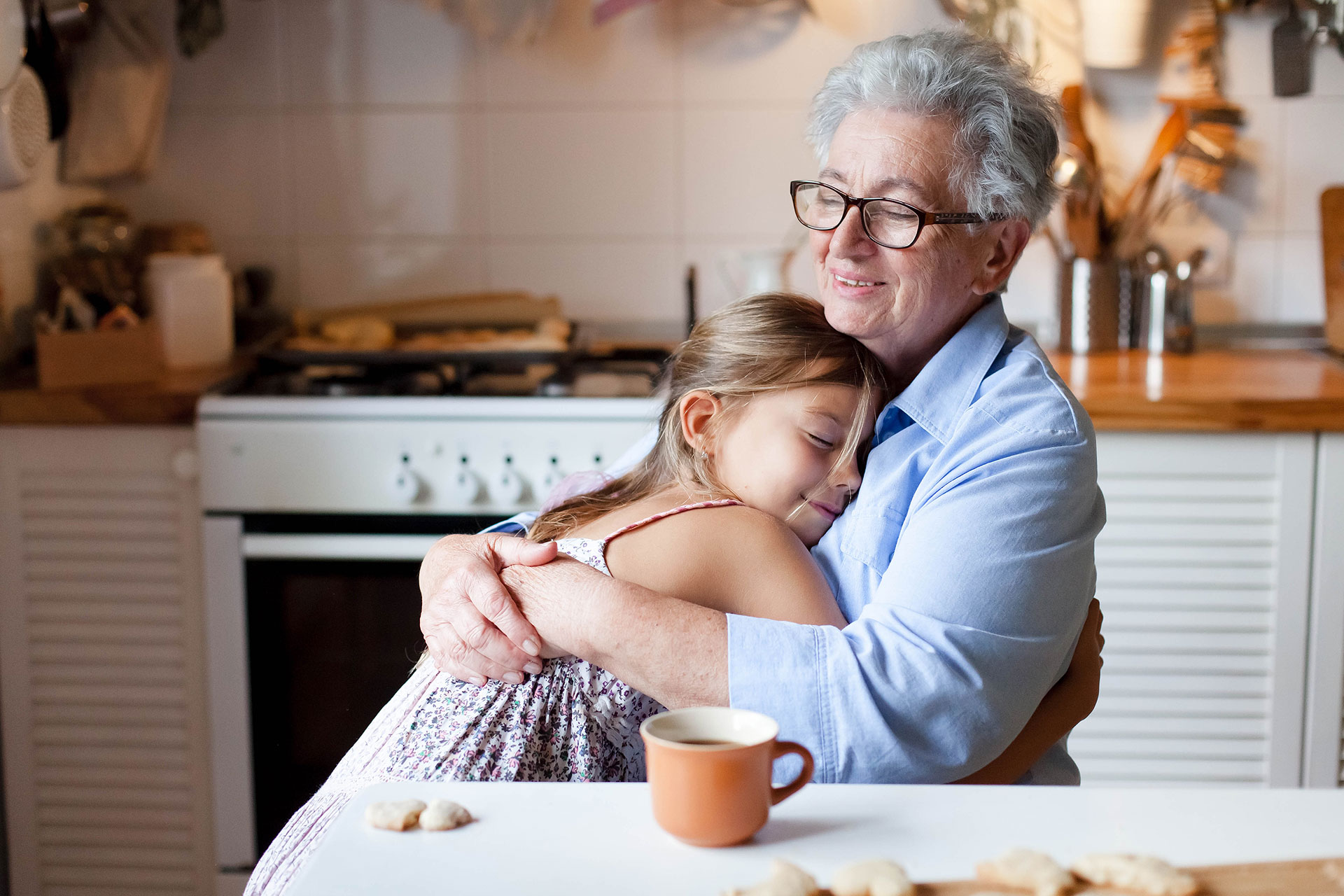 grief & Healing - Senior-Woman-Hugging-Child